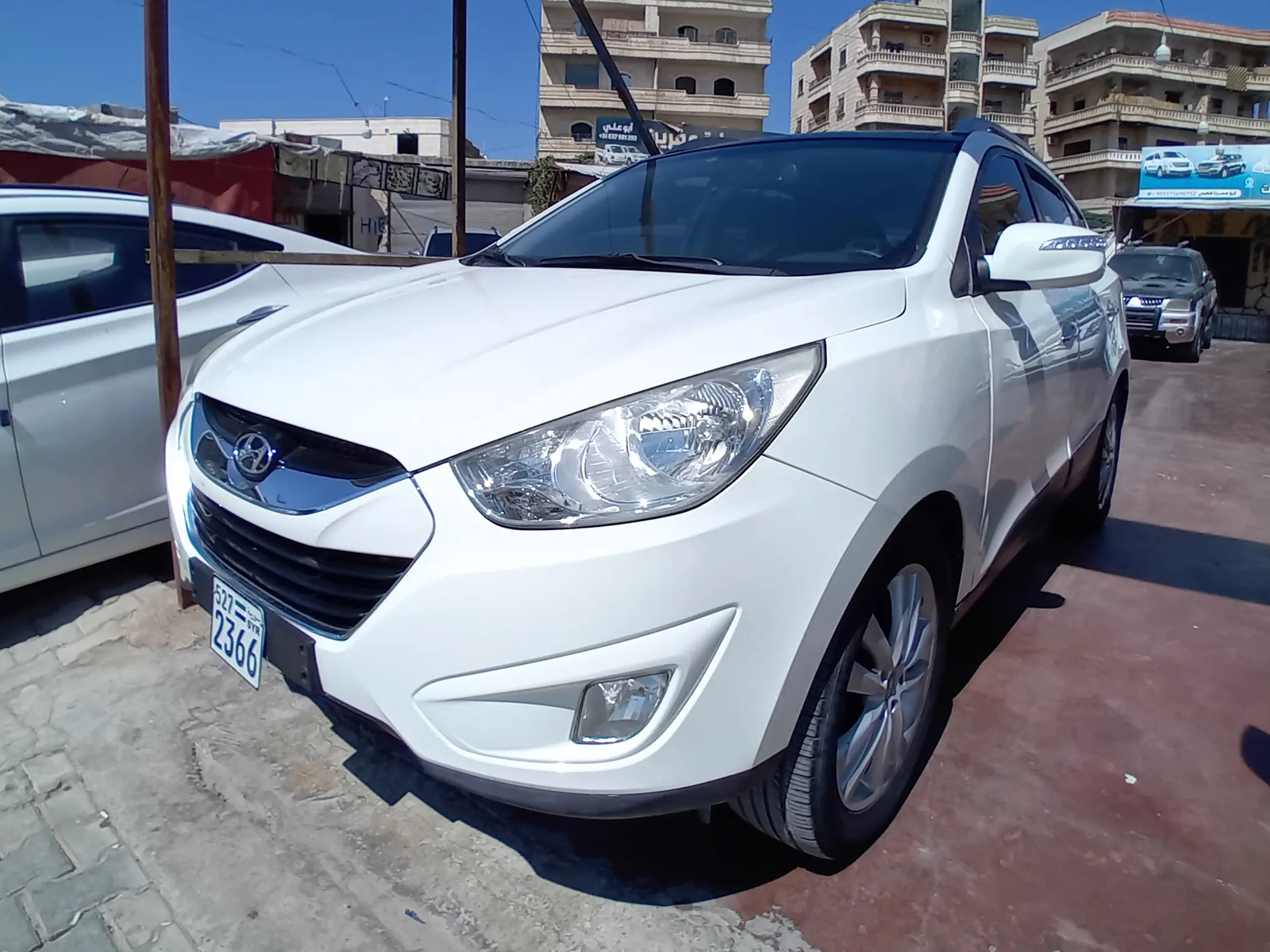 kilometrage car sale hyundai tucson lx20 evgt suv used 2011 aleppo rj card image