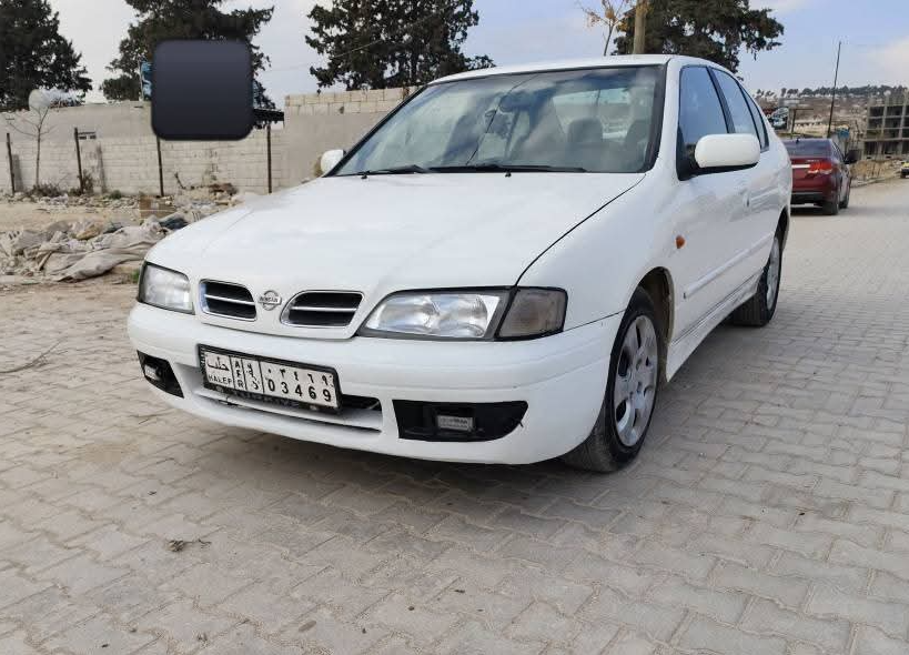 kilometrage car sale nissan primera standard sedan used 2001 aleppo zj card image