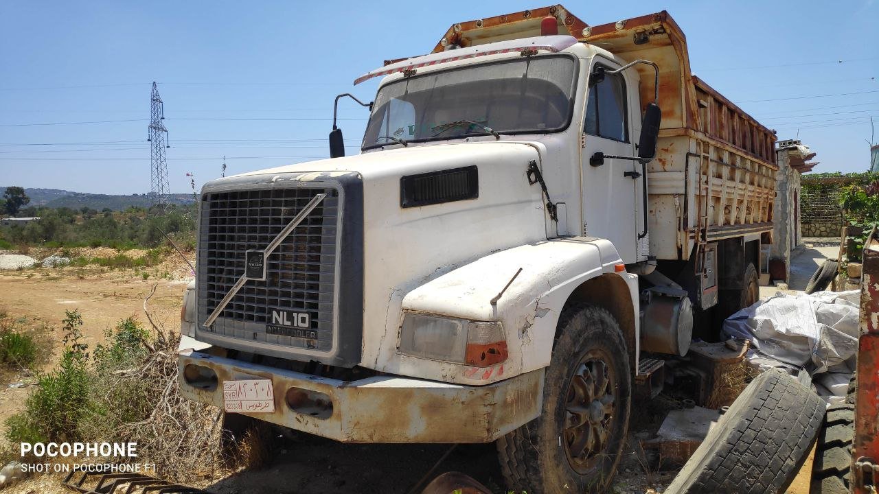 kilometrage truck volvo nl 10 standard dump trucks used 1998 tartus xv image