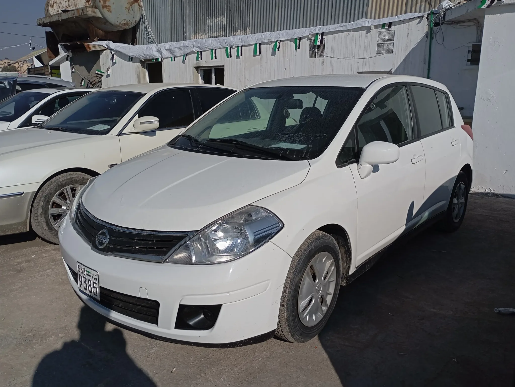 kilometrage car sale nissan tiida standard hatchback used 2013 aleppo tm card image