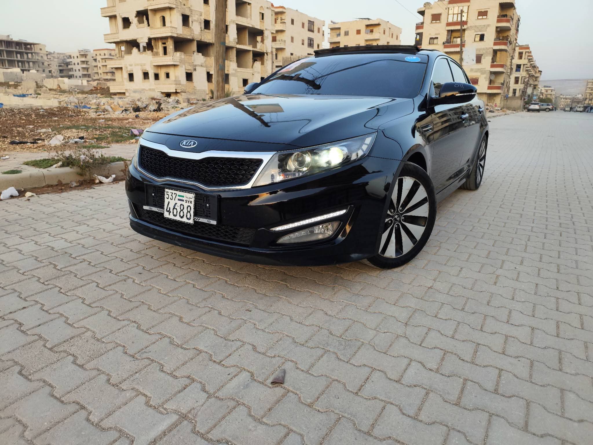 kilometrage car sale kia k5 standard sedan used 2012 aleppo mo card image