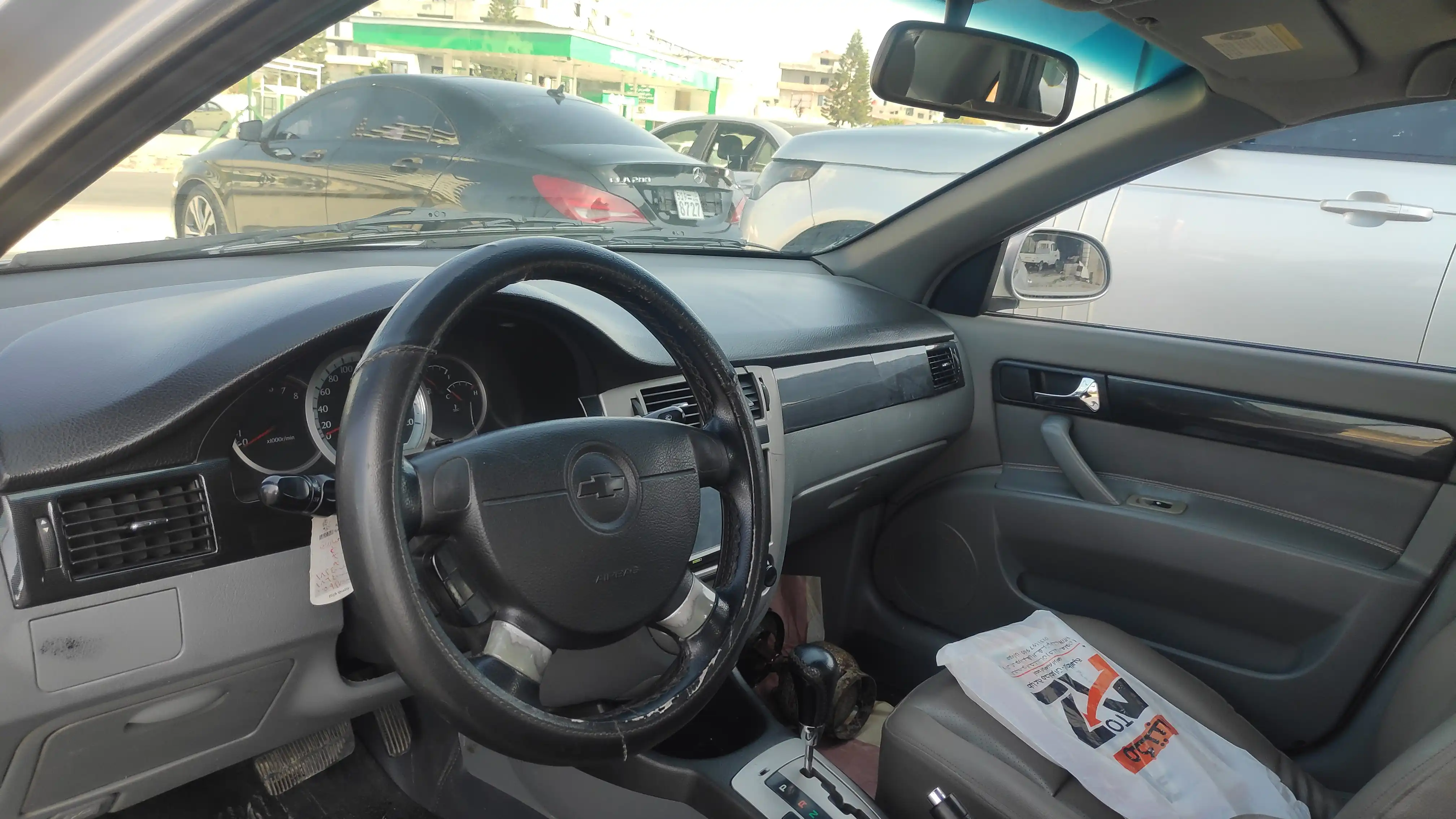 kilometrage car sale chevrolet optra ls sedan used 2009 tartus ly image