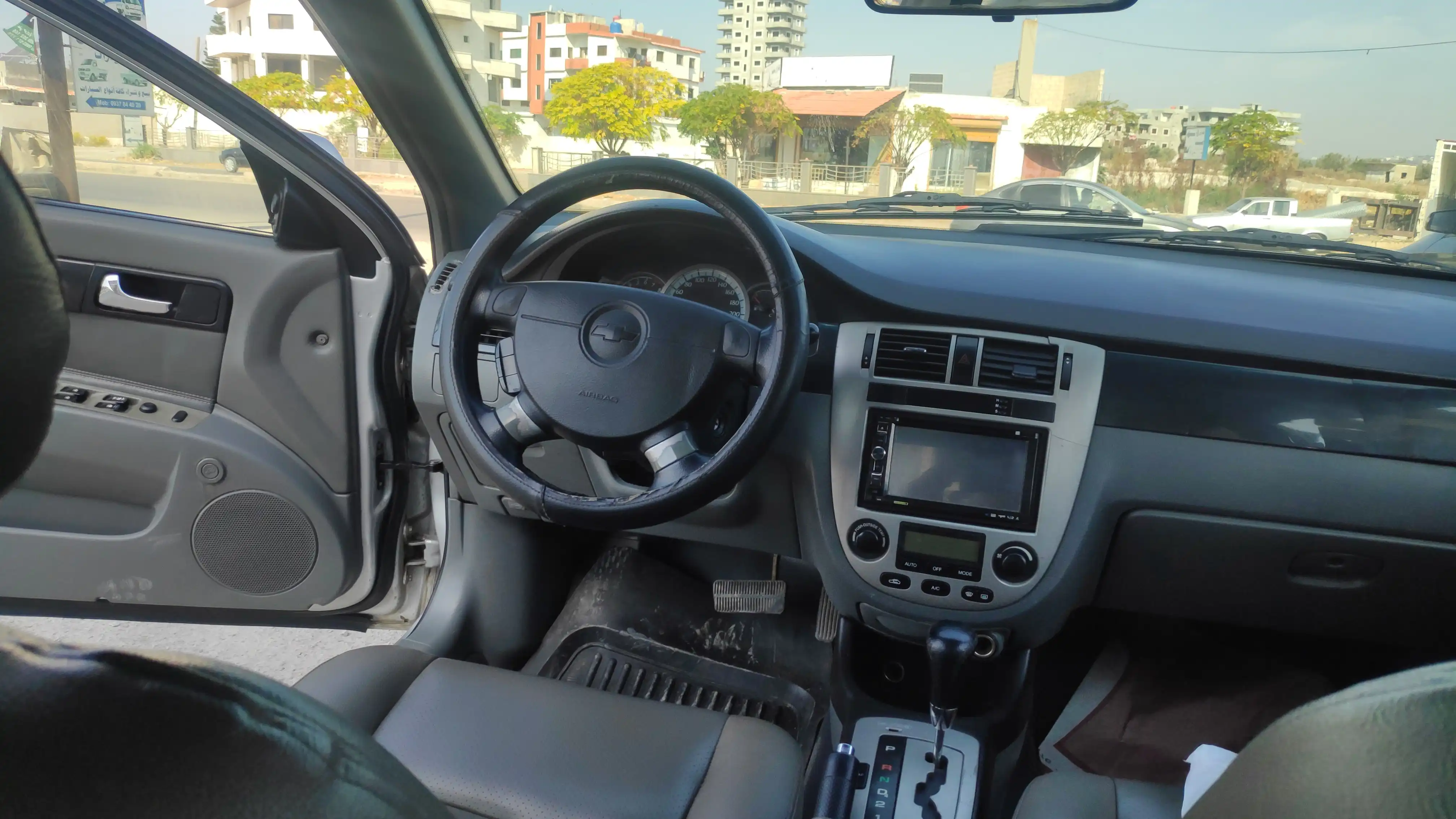 kilometrage car sale chevrolet optra ls sedan used 2009 tartus ly image