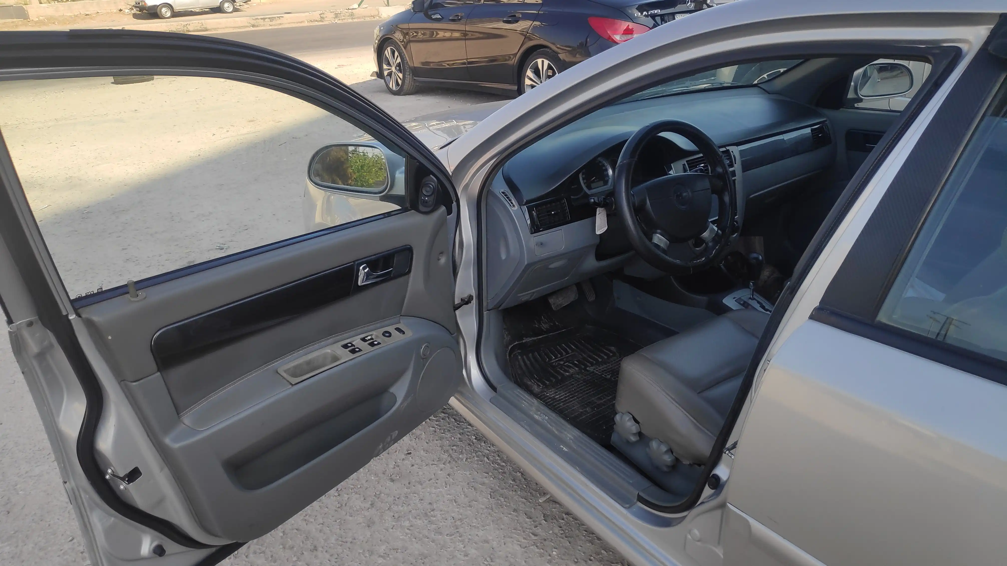 kilometrage car sale chevrolet optra ls sedan used 2009 tartus ly image